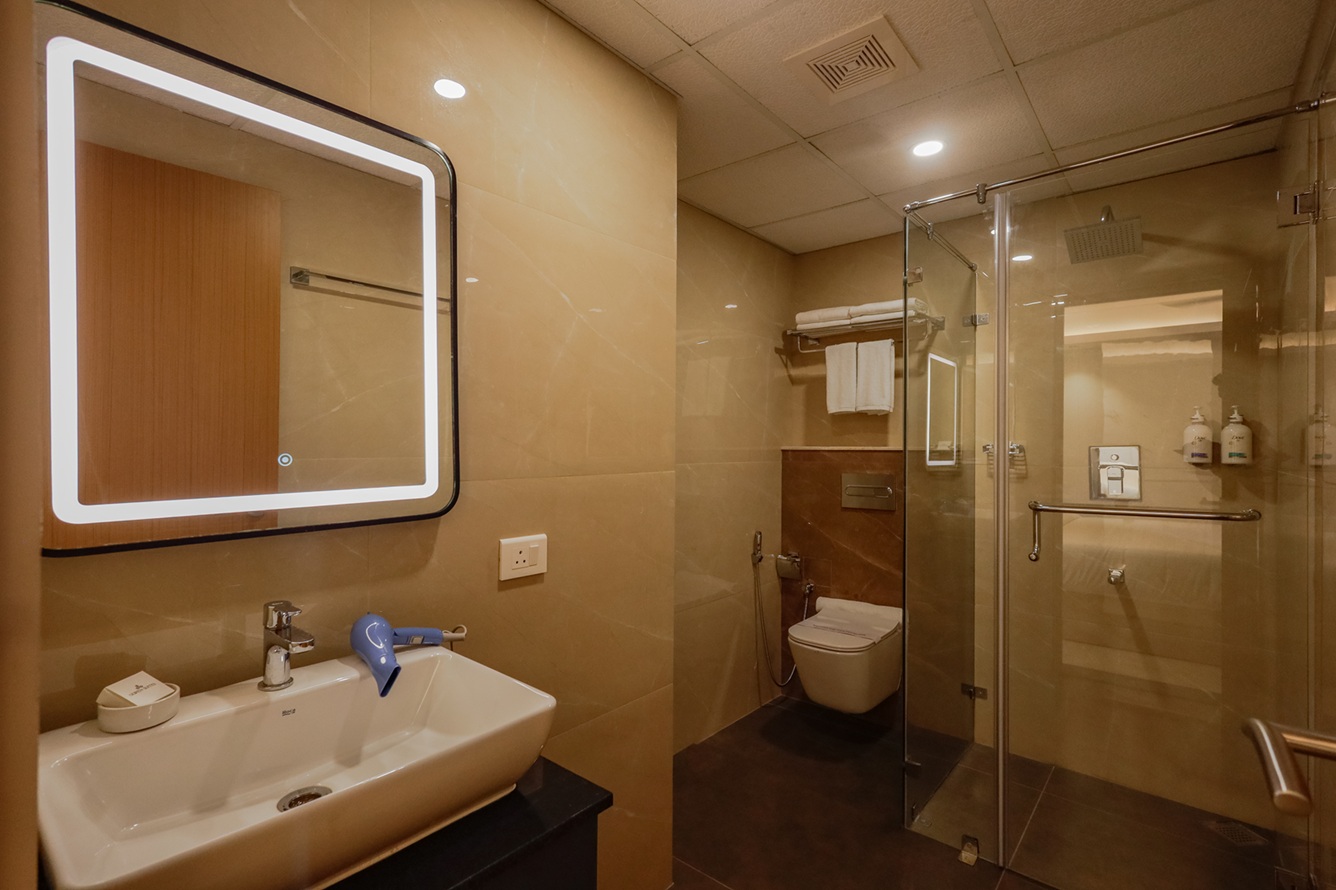 Luxurious bathroom with a large bathtub and premium toiletries